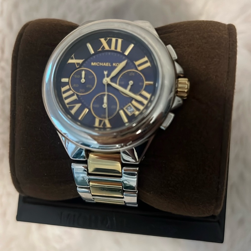 Michael Kors silver and gold watch w/blue face! Still has plastic cover on back!